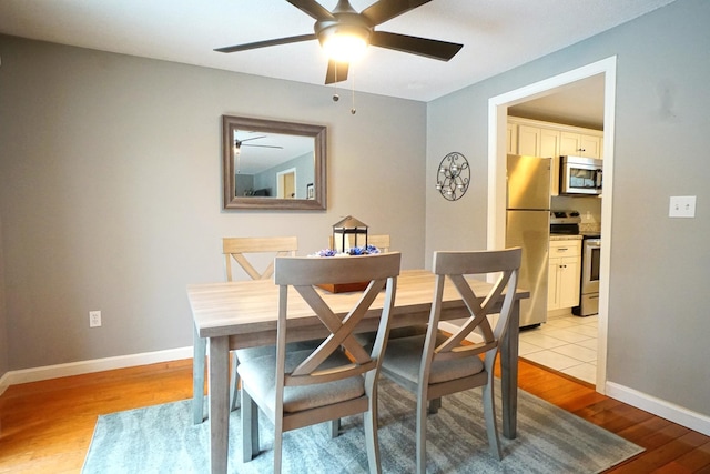 dining space featuring light hardwood / wood-style flooring