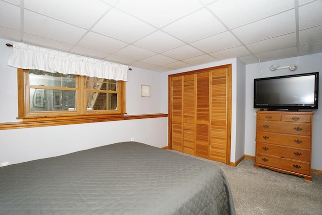 unfurnished bedroom featuring carpet flooring and a closet