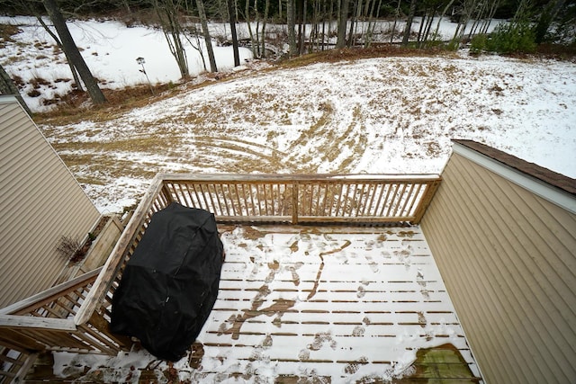 view of snow covered deck