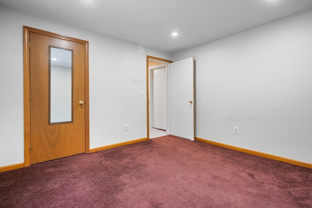 unfurnished room featuring carpet floors