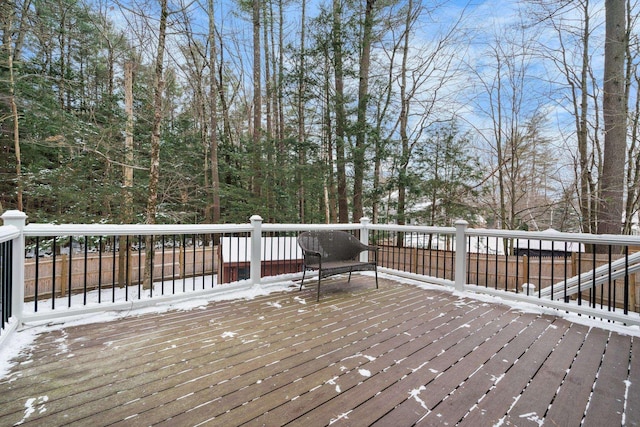 view of snow covered deck