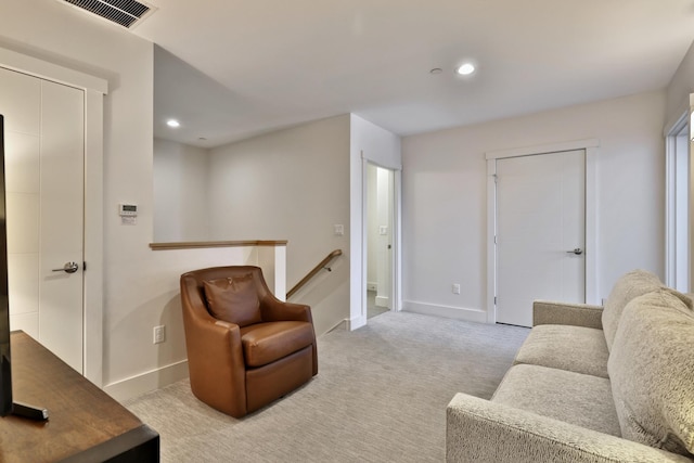 living room with light carpet