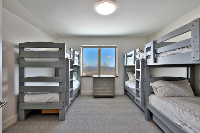 bedroom featuring light carpet