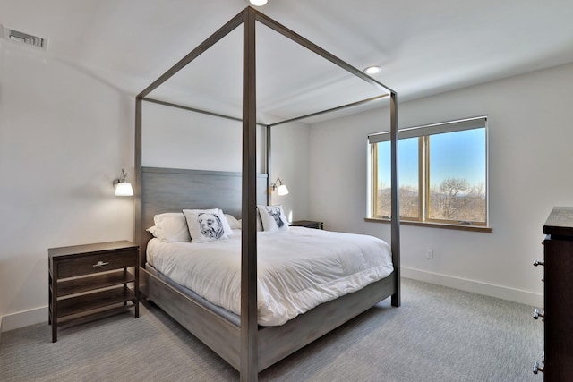 bedroom with light carpet