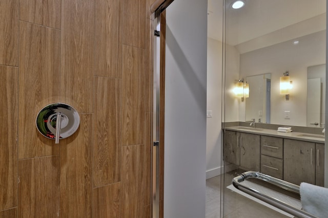 bathroom with vanity and tile patterned floors