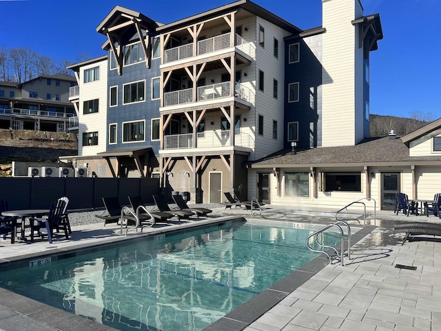 view of swimming pool featuring a patio