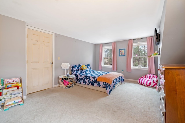 bedroom with light colored carpet