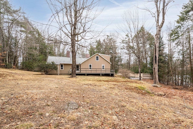 view of yard with a wooden deck