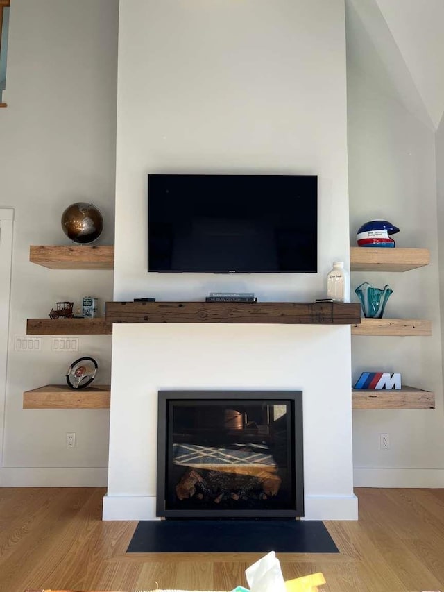 interior details featuring hardwood / wood-style floors