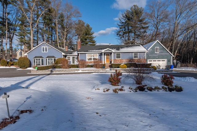 ranch-style house featuring a garage