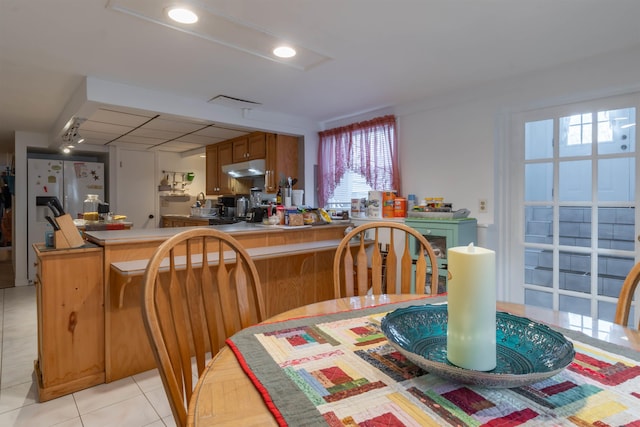 view of tiled dining area