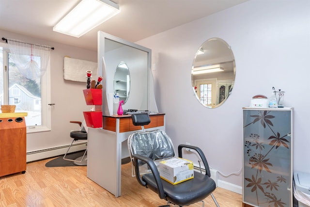 bathroom featuring a baseboard radiator and wood-type flooring