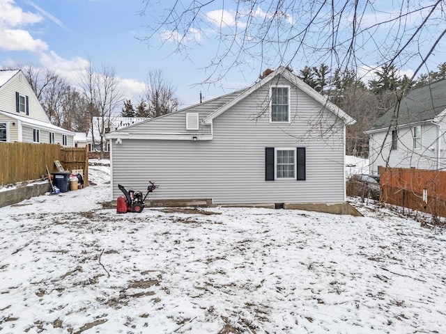 view of snow covered property