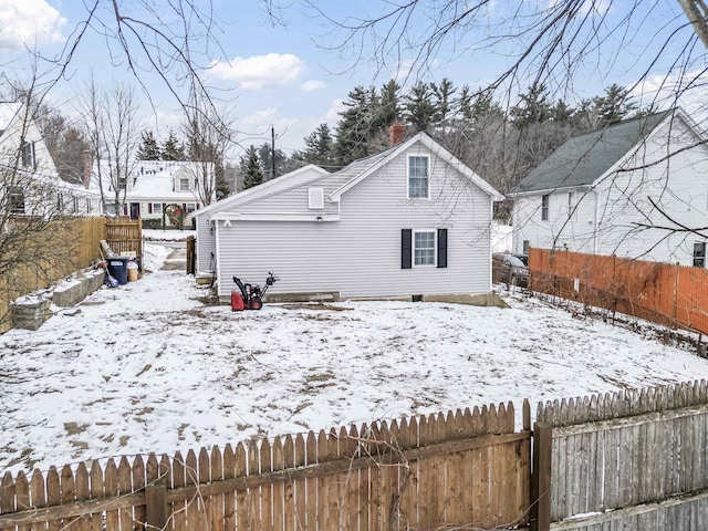 view of snow covered house