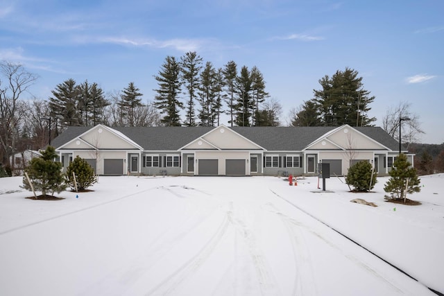 single story home featuring a garage