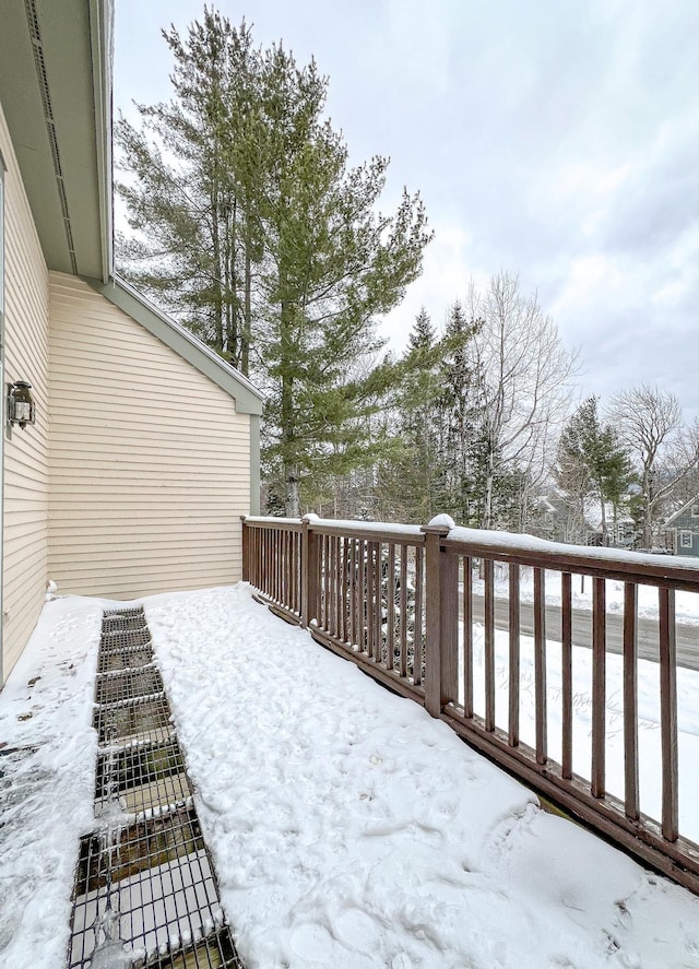 view of snow covered deck