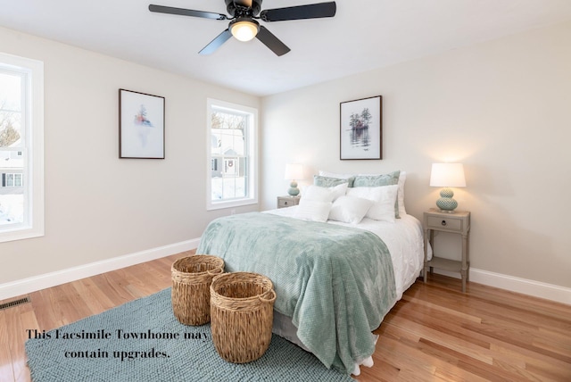 bedroom featuring ceiling fan and hardwood / wood-style flooring