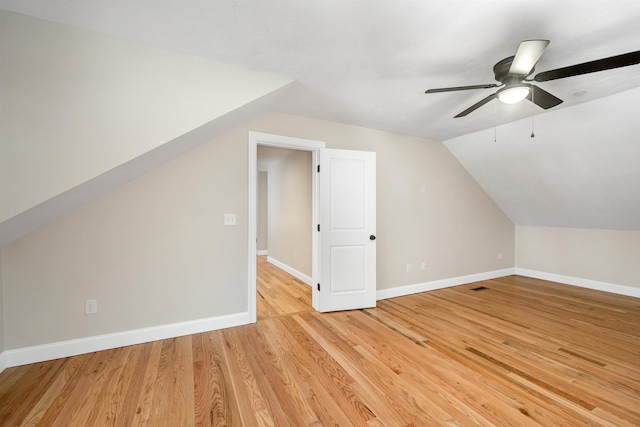 bonus room with vaulted ceiling, ceiling fan, and light hardwood / wood-style floors