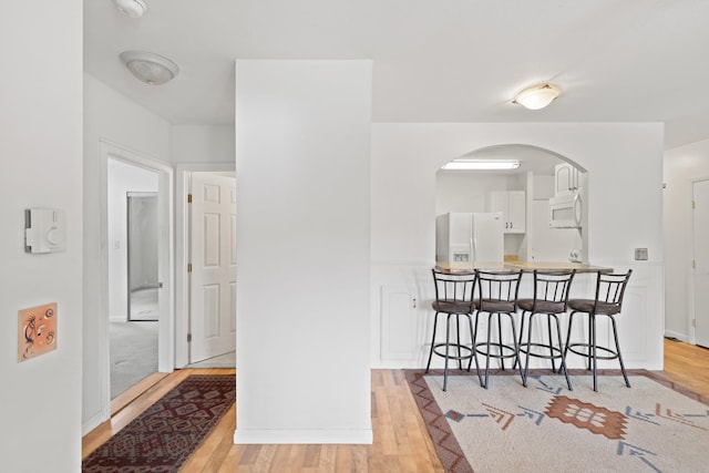 hallway featuring light hardwood / wood-style floors