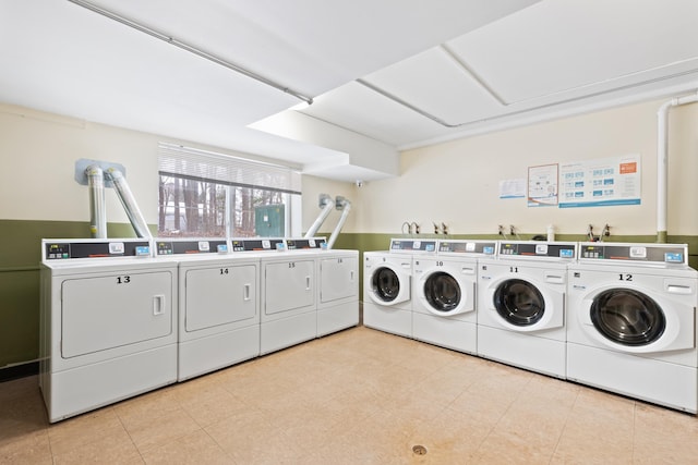 laundry area with separate washer and dryer