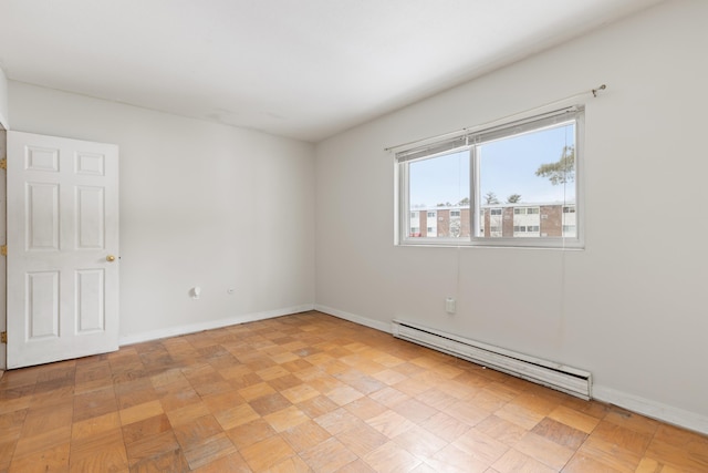 spare room with a baseboard radiator