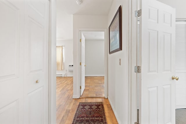 hallway featuring light wood-type flooring