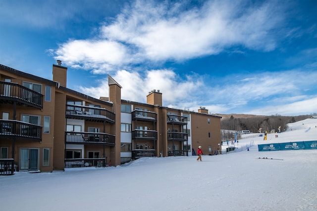 view of snow covered property