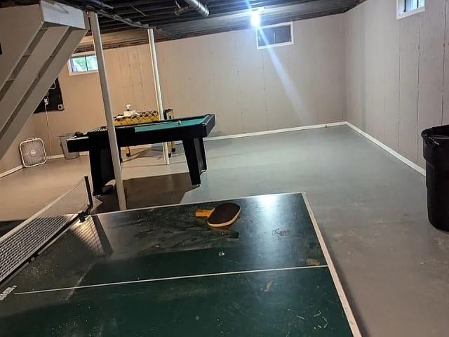 recreation room with billiards and concrete flooring