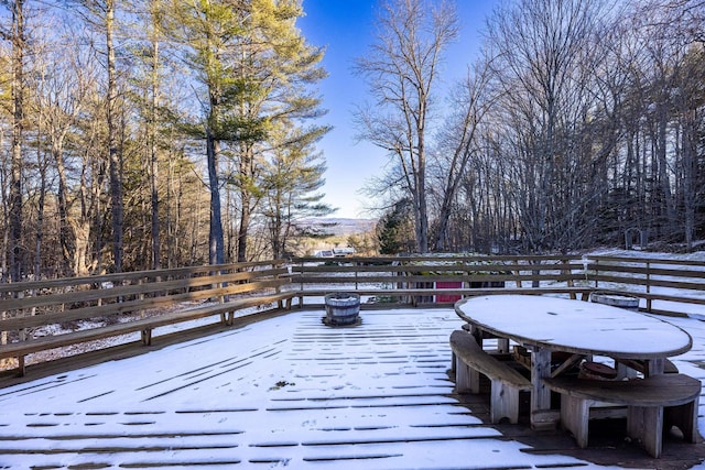 view of snow covered deck