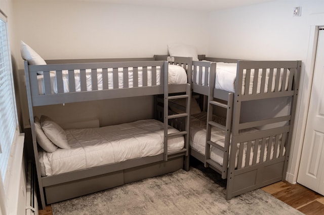 bedroom with hardwood / wood-style flooring