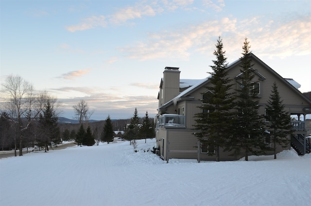 view of snow covered property