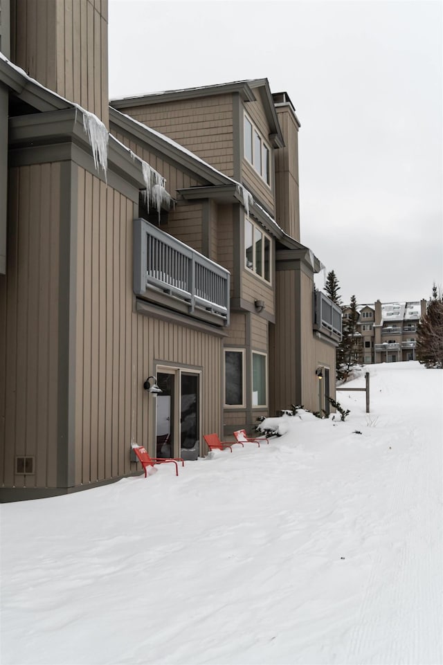 view of snow covered property