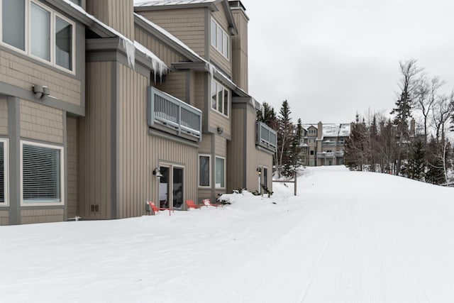 view of snow covered building