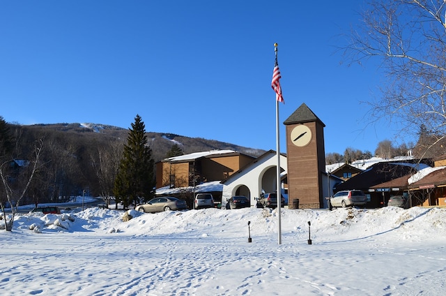 view of snow covered property