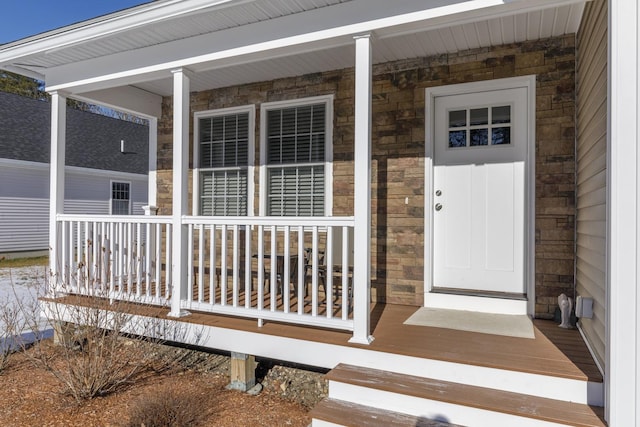 entrance to property with covered porch