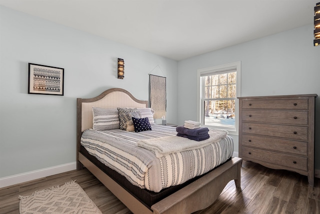 bedroom with hardwood / wood-style flooring