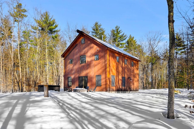 view of snow covered house