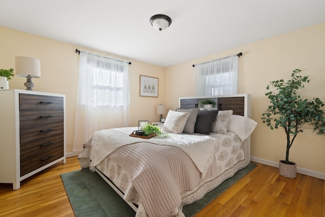 bedroom featuring light hardwood / wood-style floors