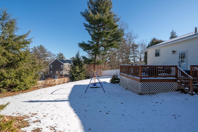 view of yard with a wooden deck