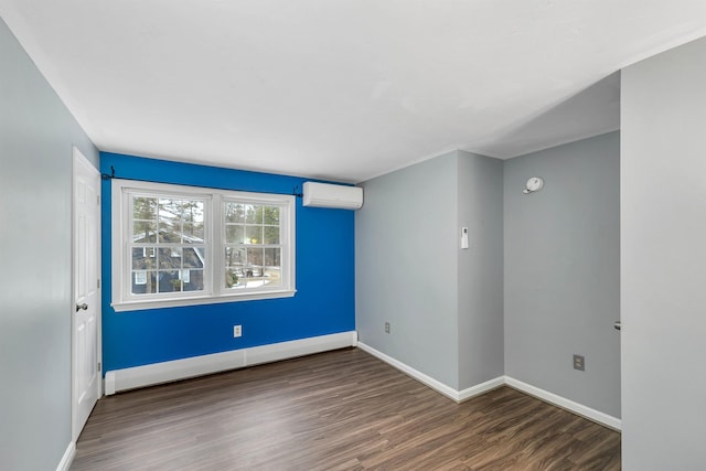 empty room featuring dark wood-type flooring, a wall mounted air conditioner, and a baseboard radiator