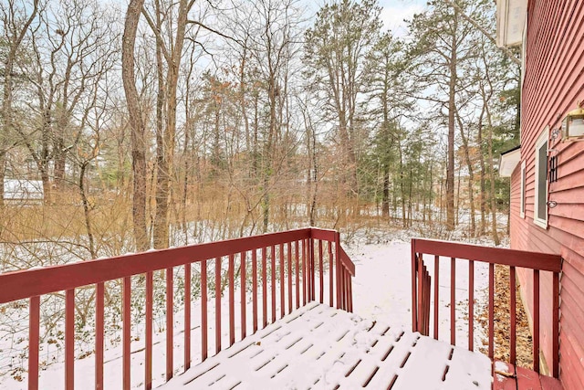 view of snow covered deck