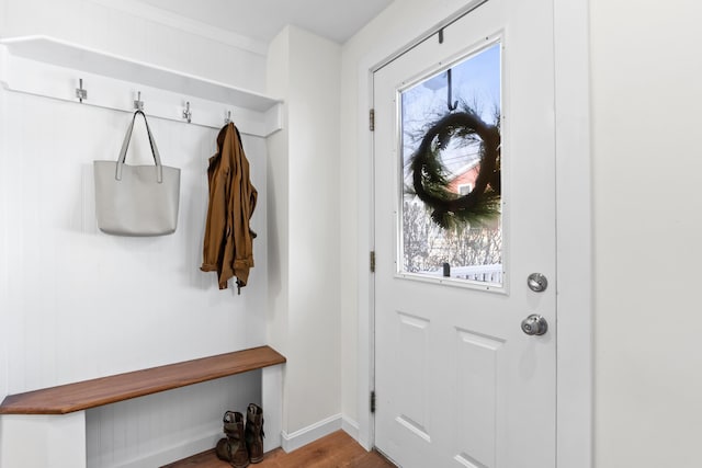 mudroom with wood-type flooring