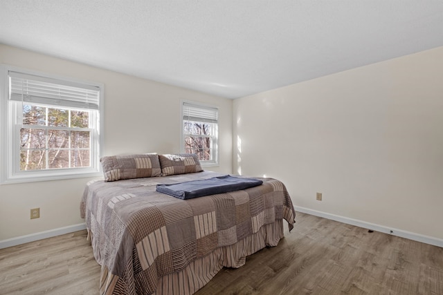 bedroom featuring light hardwood / wood-style flooring