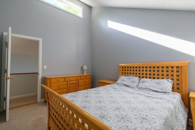 bedroom with light colored carpet