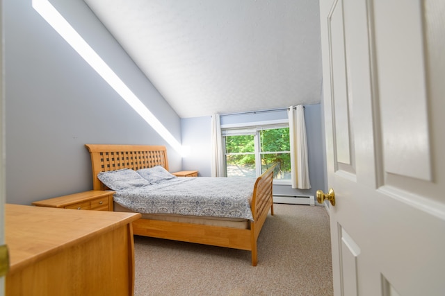 bedroom featuring light colored carpet, lofted ceiling, and a baseboard heating unit