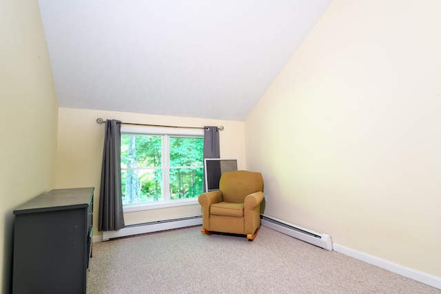 sitting room with lofted ceiling and a baseboard radiator