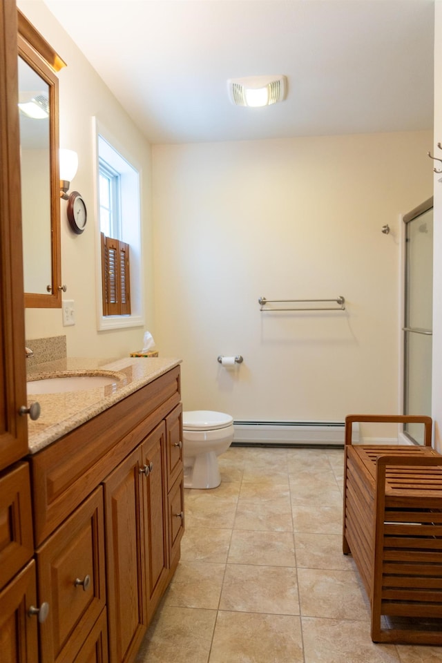 bathroom featuring toilet, walk in shower, tile patterned floors, a baseboard radiator, and vanity