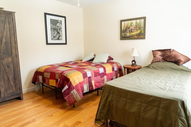 bedroom featuring hardwood / wood-style flooring