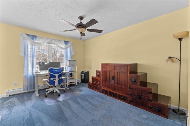 office space featuring a textured ceiling, ceiling fan, and carpet flooring