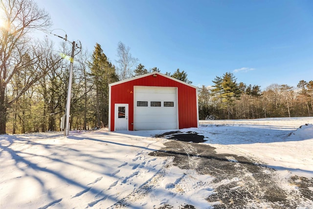 view of snow covered garage